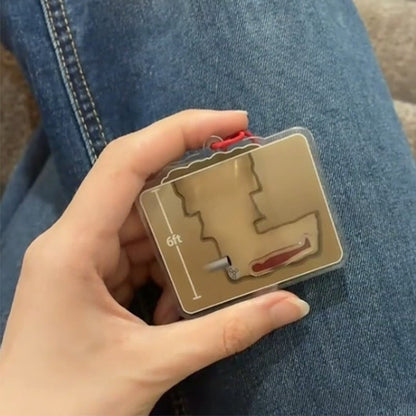 🕳️ Saddam Capture Maze Keychain